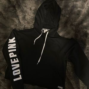 Pink cropped sweatshirt with exposed shoulder